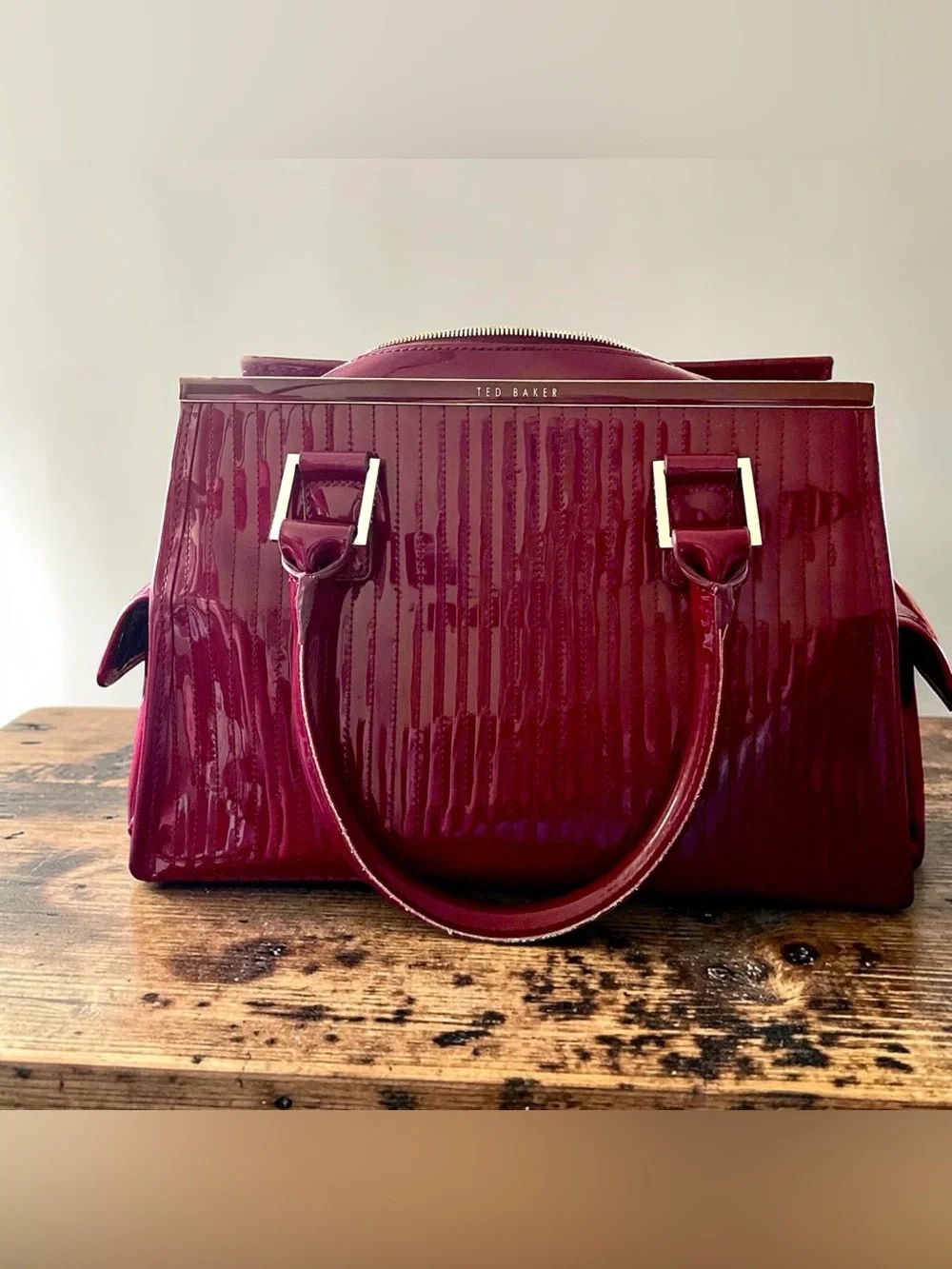Ted Baker London burgundy French bulldog structured patent leather handbag